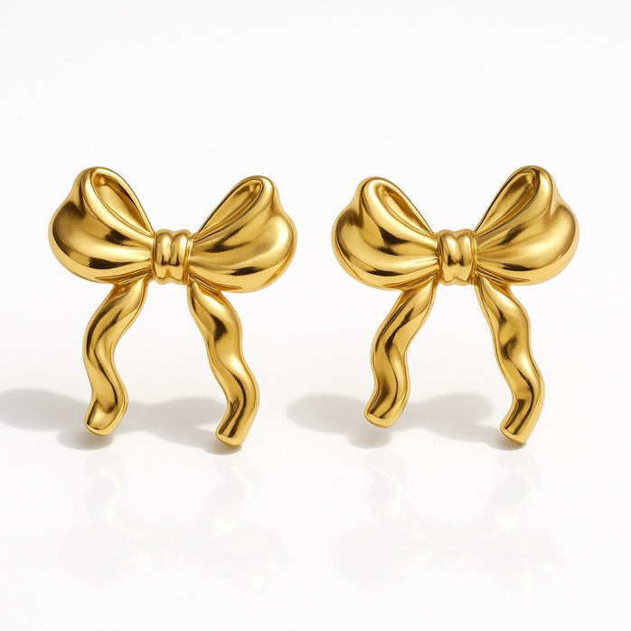 Gouden strikjes oorbellen - stainless steel